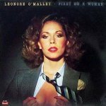 Leonore O'Malley - First Be a Woman